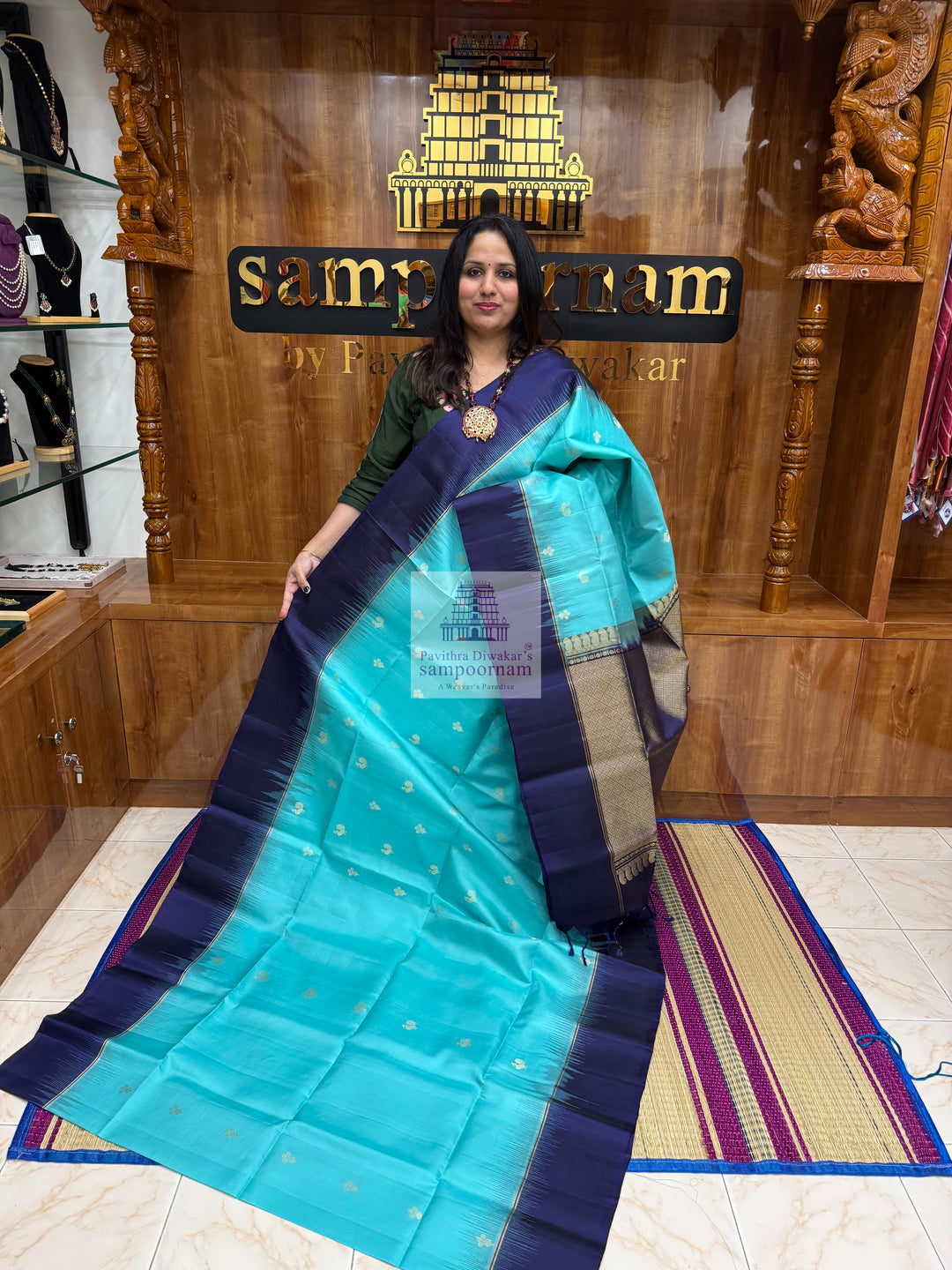 Blue with Dark Blue ,  Vairaoosi lines in the border , Annam and Floral butta in the body and rich Pallu Pure Soft Silk Saree