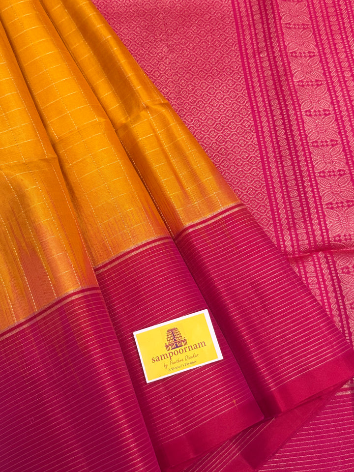 Manjal with Orangish Pink , rich zari annam and rudraksh butta in the body , plain borders and rich Pallu , pure soft silk saree