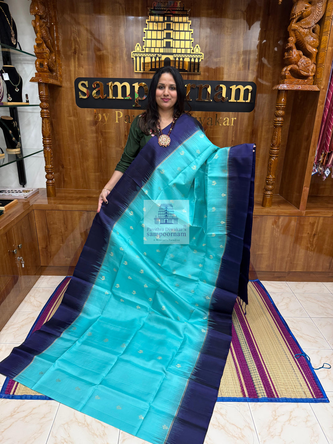Blue with Dark Blue ,  Vairaoosi lines in the border , Annam and Floral butta in the body and rich Pallu Pure Soft Silk Saree