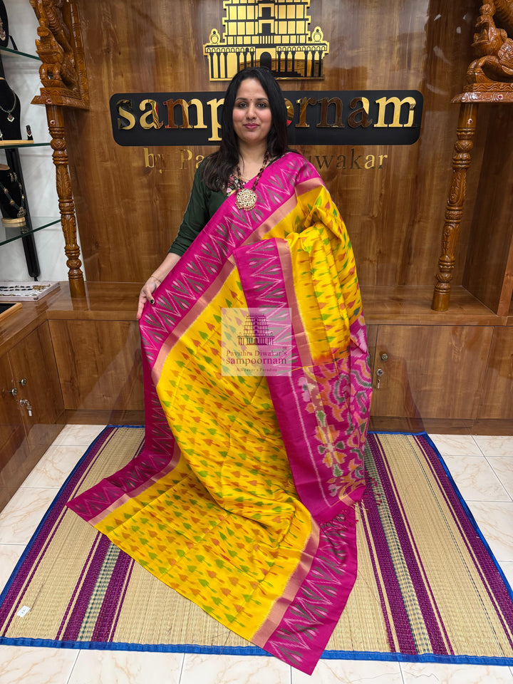 Yellow with Pink , Pochampally designs in the body  and grand  Pallu Pure Soft Silk Saree