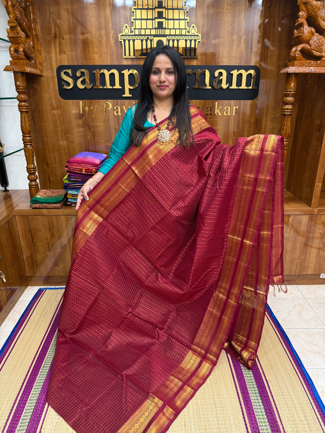 Kumkum Red , Zari  butta in the body , Traditional border and rich Pallu Lakshadeepam Silk Cotton Saree