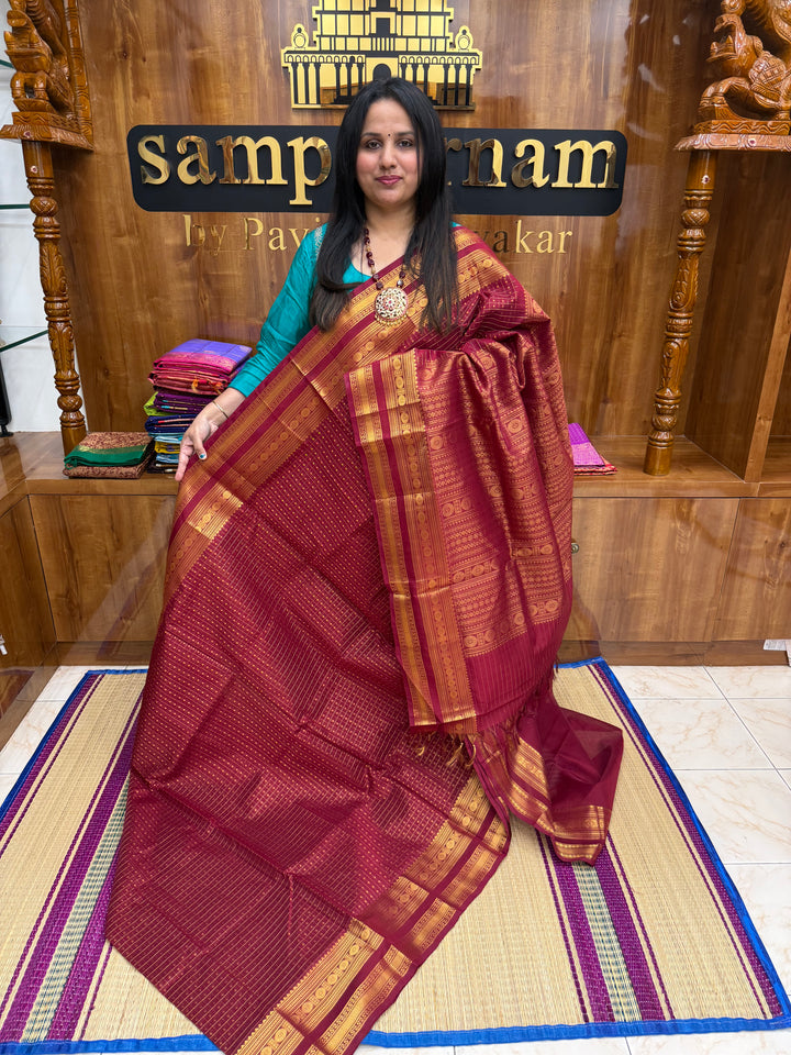Kumkum Red , Zari  butta in the body , Traditional border and rich Pallu Lakshadeepam Silk Cotton Saree