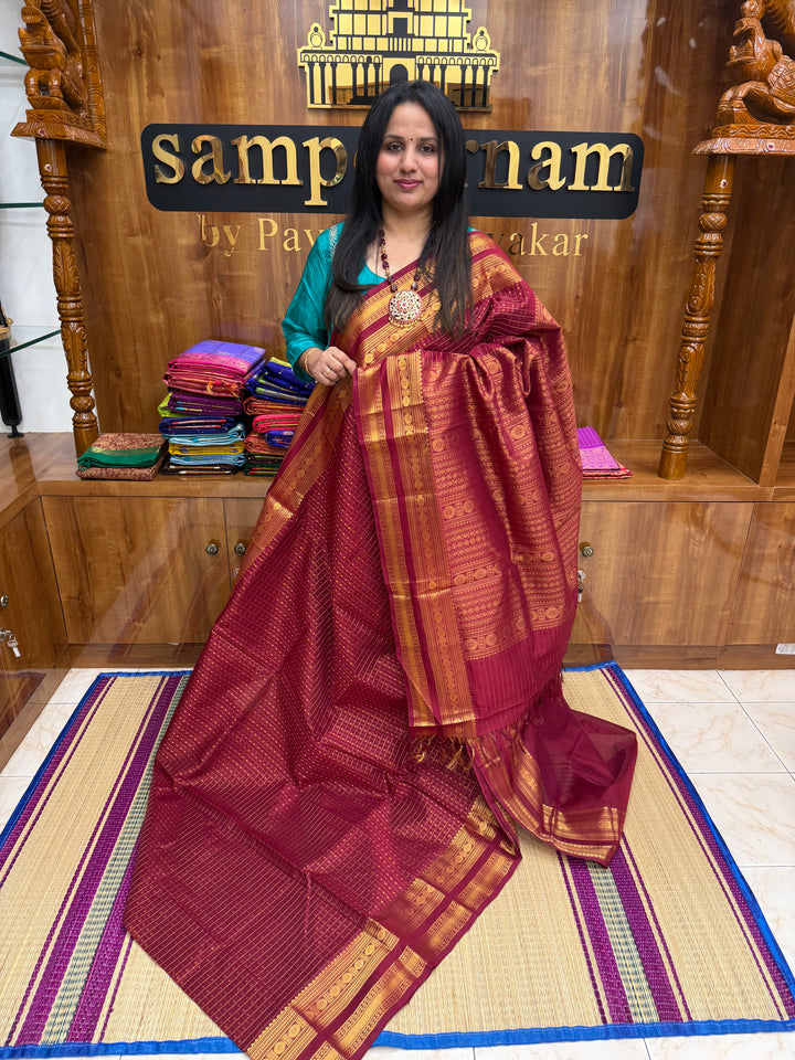 Kumkum Red , Zari  butta in the body , Traditional border and rich Pallu Lakshadeepam Silk Cotton Saree