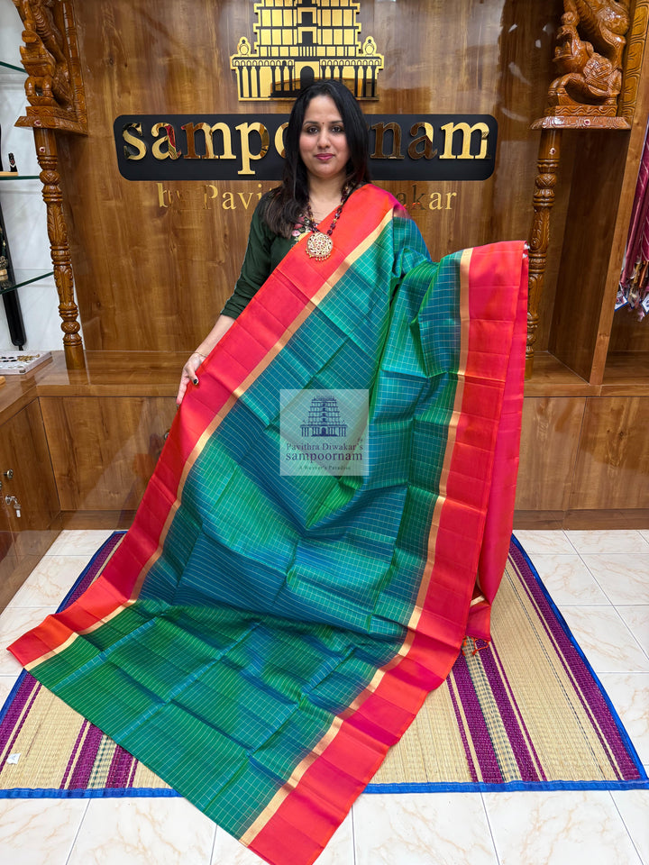 Ramar Blue with Orangish Pink , Zari checks in the body and rich Pallu Pure Soft Silk Saree