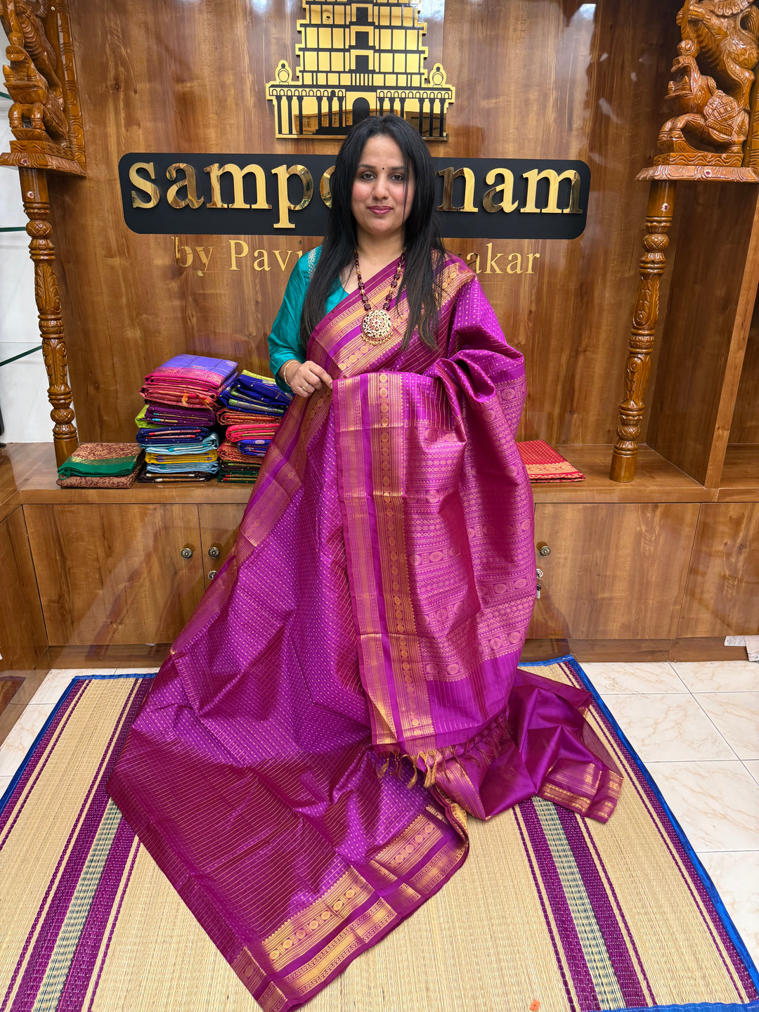 Magenta , Zari  butta in the body , Traditional border and rich Pallu Lakshadeepam Silk Cotton Saree
