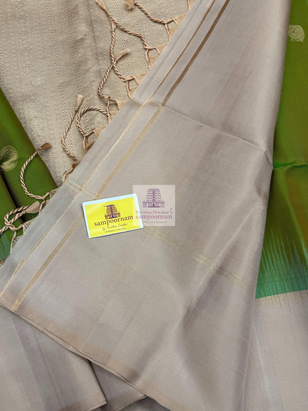Manthulir Green with Beige ,  Vairaoosi lines in the border , Annam and Chakram butta in the body and rich Pallu Pure Soft Silk Saree
