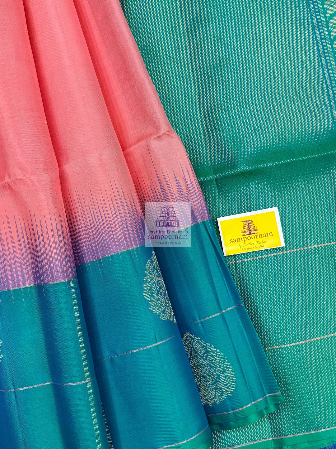 Baby Pink with Green , Vairaoosi lines in the border , rich Zari butta in the body and grand  Pallu Pure Soft Silk Saree
