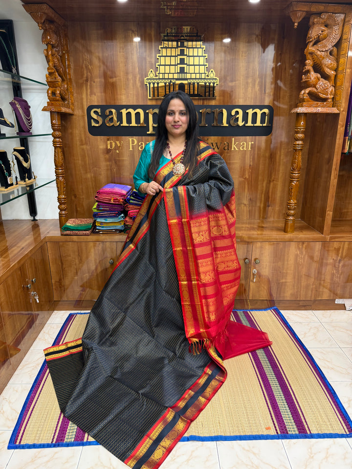 Dark Blue with Red , Zari  butta in the body , rettapet border and rich Pallu Lakshadeepam Silk Cotton Saree