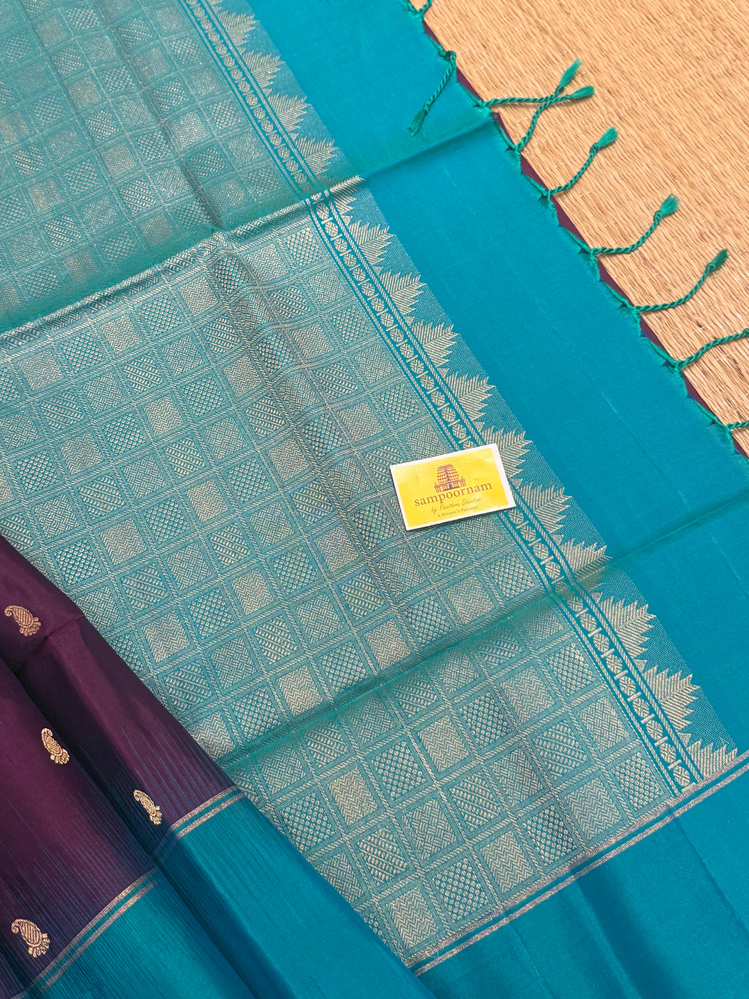 Purple with Turquoise Blue , Mango zari motif in the body , plain borders and rich Pallu , pure soft silk saree