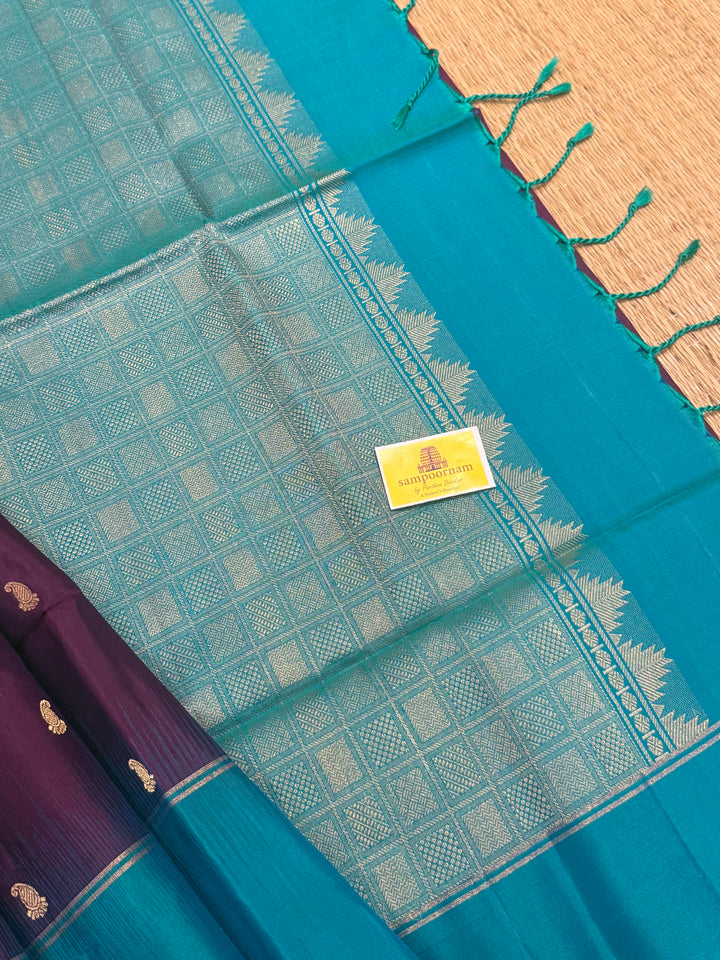 Purple with Turquoise Blue , Mango zari motif in the body , plain borders and rich Pallu , pure soft silk saree