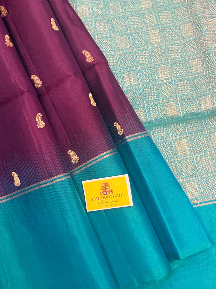 Purple with Turquoise Blue , Mango zari motif in the body , plain borders and rich Pallu , pure soft silk saree