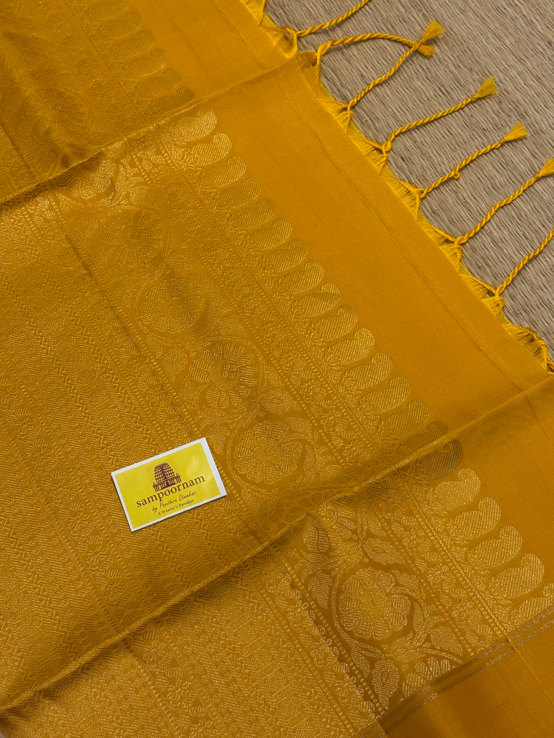 Offwhite with Lemon Yellow rich Zari rudraksh butta in the body and rich Pallu , pure soft silk saree