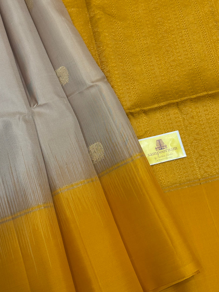 Offwhite with Lemon Yellow rich Zari rudraksh butta in the body and rich Pallu , pure soft silk saree