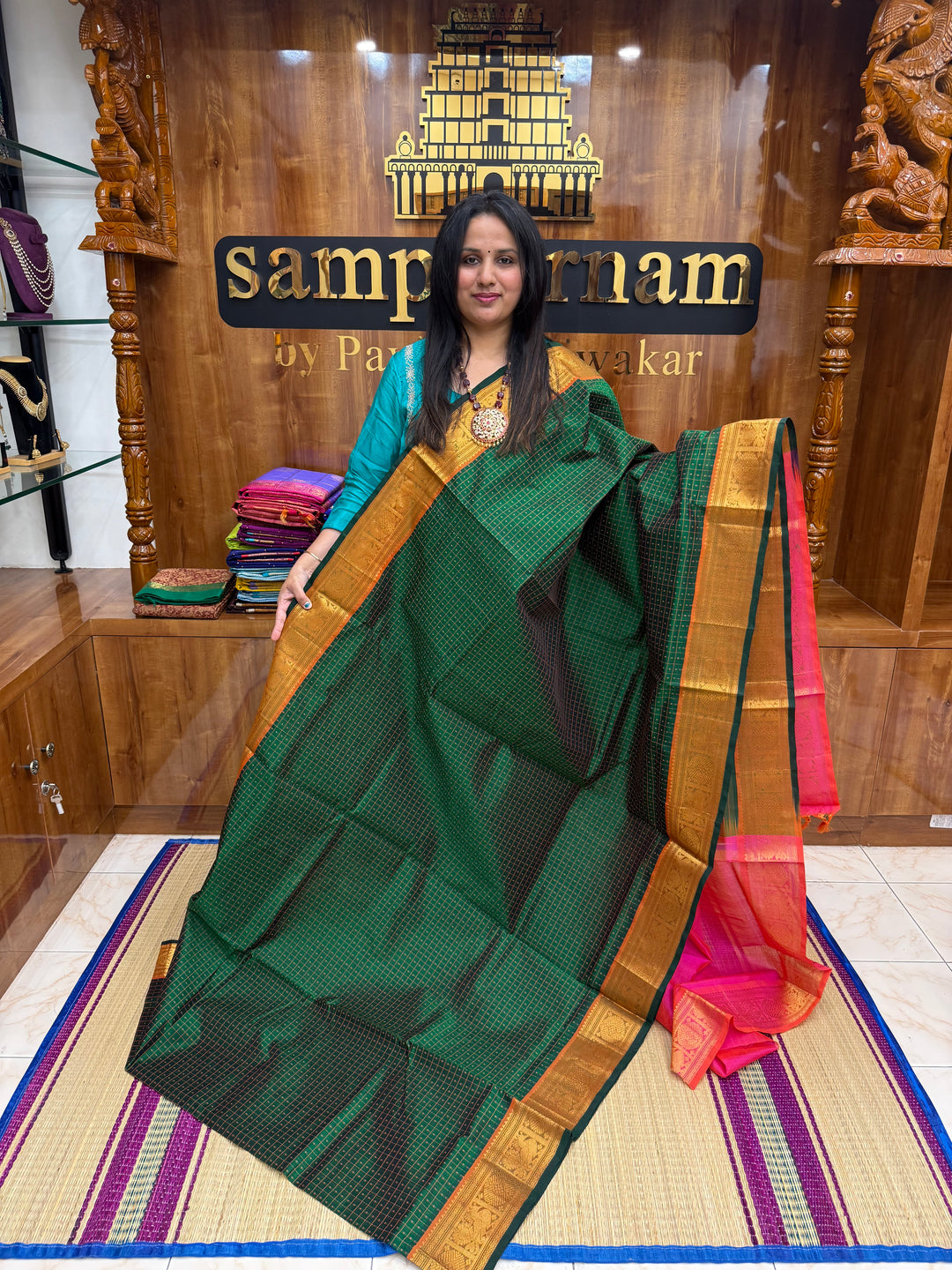 Dark Green with Pink , thread butta in the body , Traditional border and rich Pallu Lakshadeepam Silk Cotton Saree
