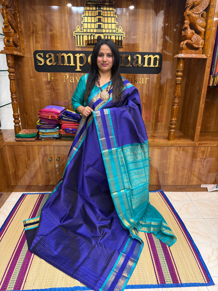 Blue with Turquoise Blue , Zari  butta in the body , rettapet  border and rich Pallu Lakshadeepam Silk Cotton Saree