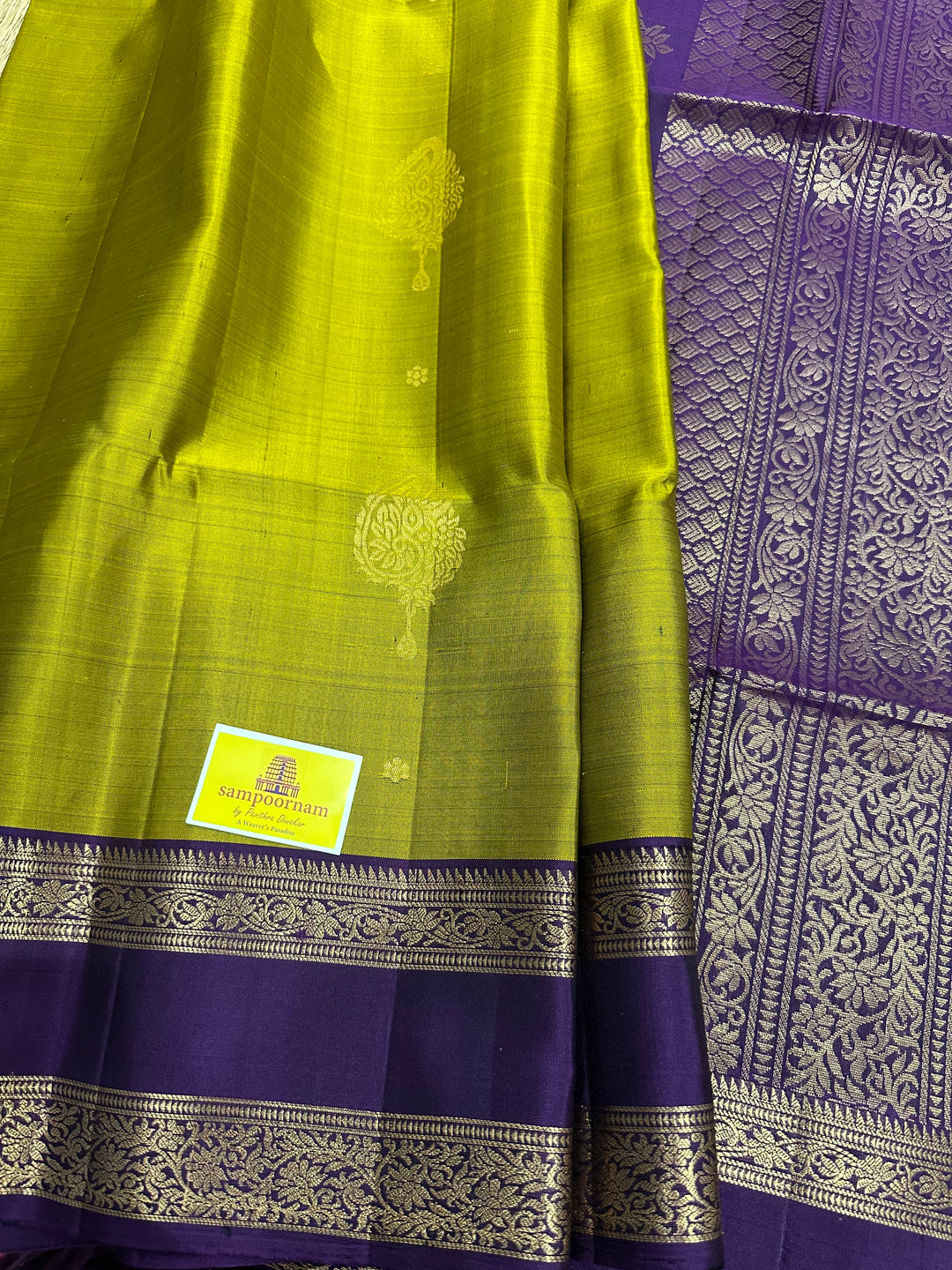 Fenugreen Gold with Purple Rettapet Border, Rich Zari Motif in the Body and Rich pallu  Pure Soft Silk Saree