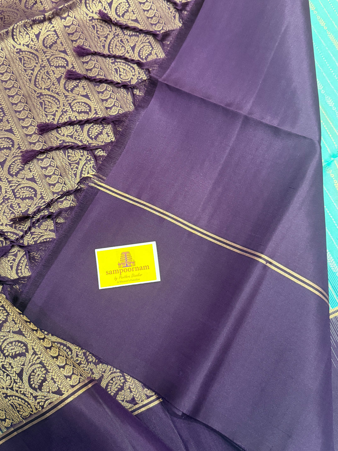 Pastel Light Blue with Purple , rich zari gold and silver zari butta in the body and grand  Pallu , pure soft silk saree