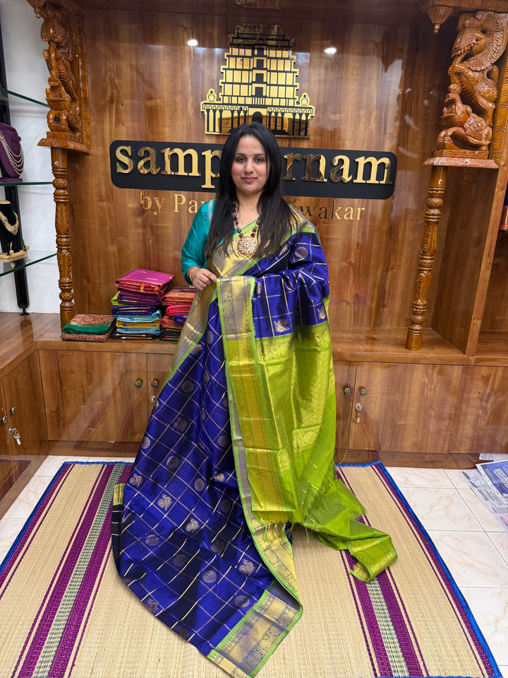 Indigo Blue with Lemon Green , Mayil and Chakram Butta in the Body, Traditional Borders and Rich Pallu Mayil Chakram Silk Cotton Saree
