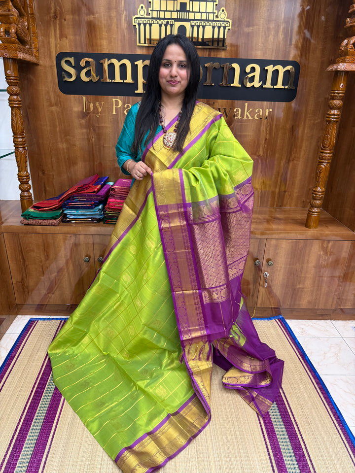 Parrot Green with Purple Mayil and Chakram Butta in the Body, Traditional Borders and Rich Pallu Mayil Chakram Silk Cotton Saree