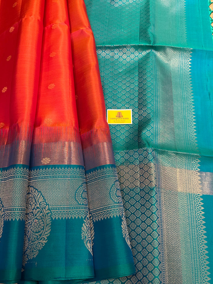 Brick Orange with Turquoise Blue , One Side Big Border , Annam and Flower Zari Motif in the Body and Rich Pallu  Pure Soft Silk Saree