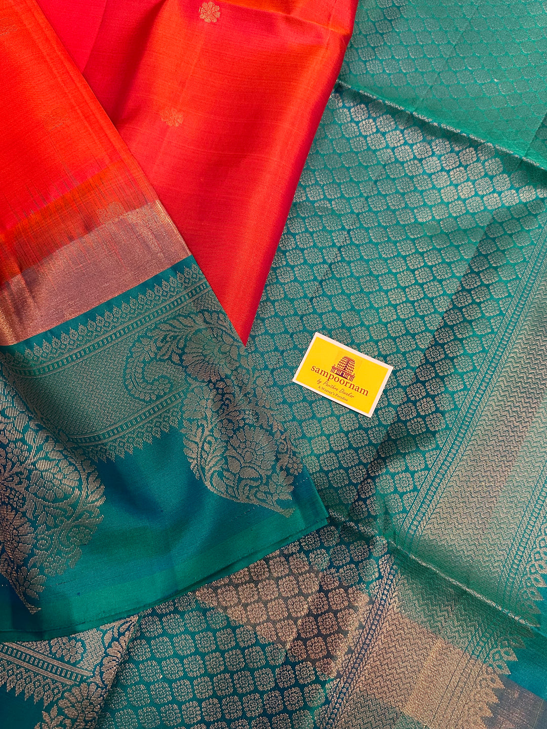 Brick Orange with Turquoise Blue , One Side Big Border , Annam and Flower Zari Motif in the Body and Rich Pallu  Pure Soft Silk Saree