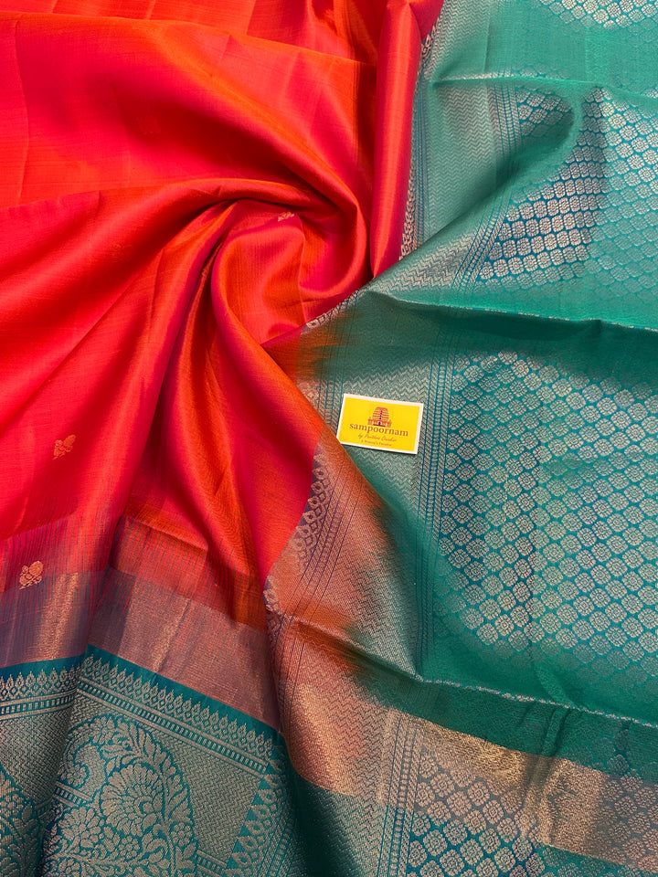 Brick Orange with Turquoise Blue , One Side Big Border , Annam and Flower Zari Motif in the Body and Rich Pallu  Pure Soft Silk Saree