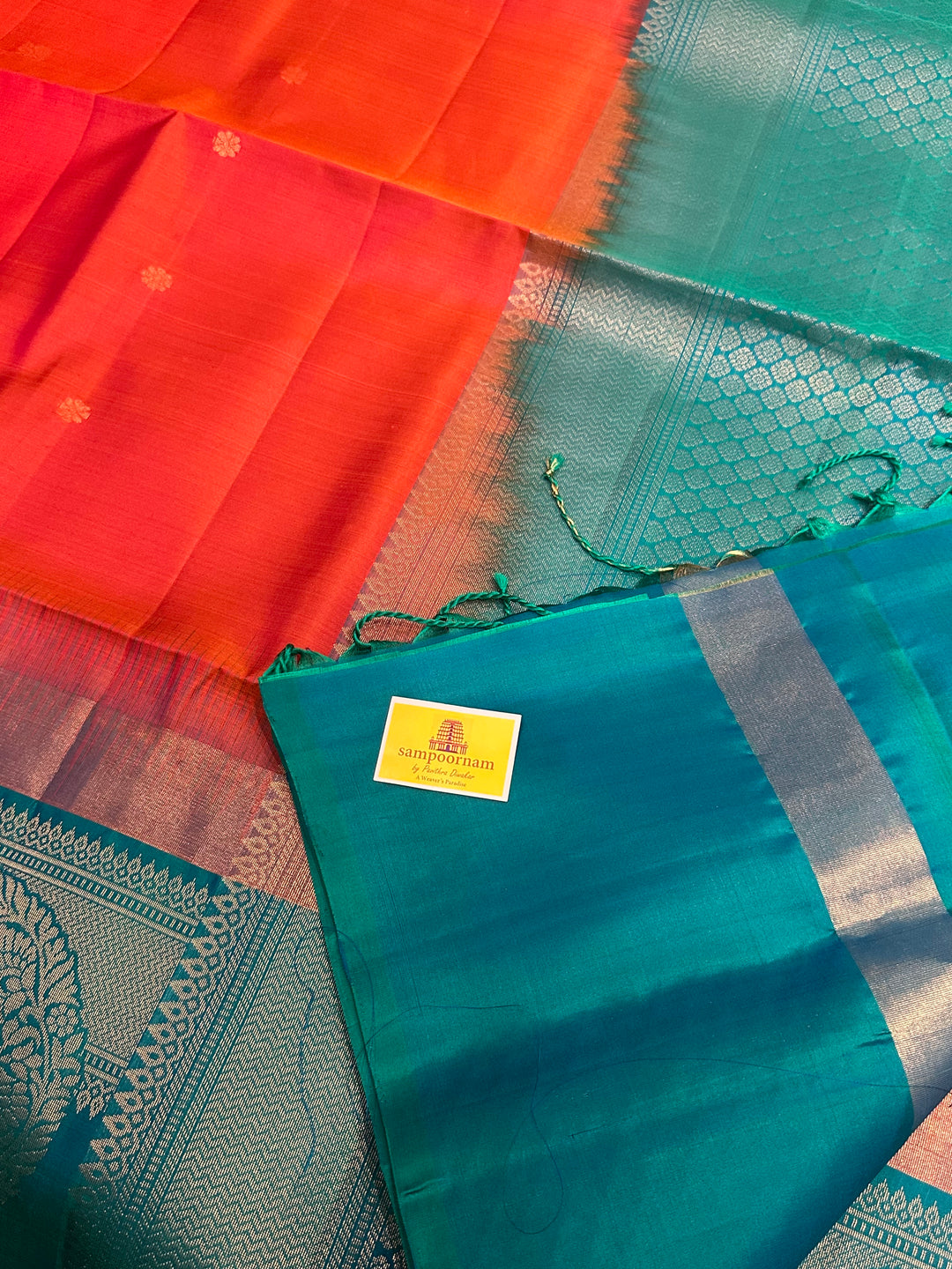 Brick Orange with Turquoise Blue , One Side Big Border , Annam and Flower Zari Motif in the Body and Rich Pallu  Pure Soft Silk Saree