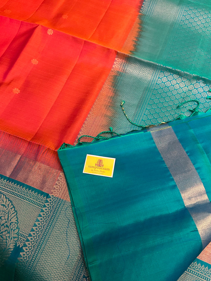 Brick Orange with Turquoise Blue , One Side Big Border , Annam and Flower Zari Motif in the Body and Rich Pallu  Pure Soft Silk Saree