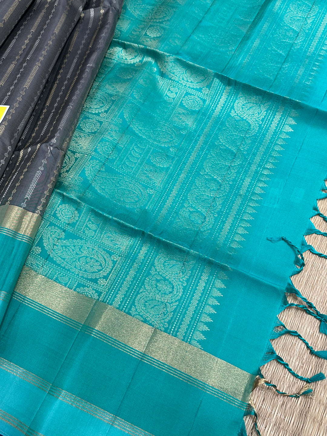 Grey With Sea Green Triple Border, Gold And Silver Zari Lines all over the body And Rich Pallu  Pure Soft Silk Saree