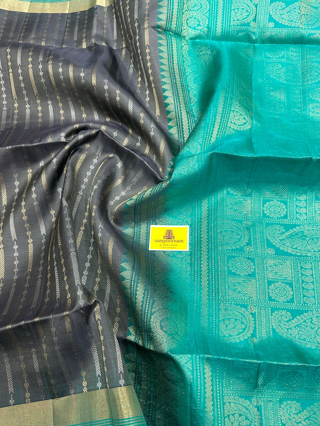 Grey With Sea Green Triple Border, Gold And Silver Zari Lines all over the body And Rich Pallu  Pure Soft Silk Saree