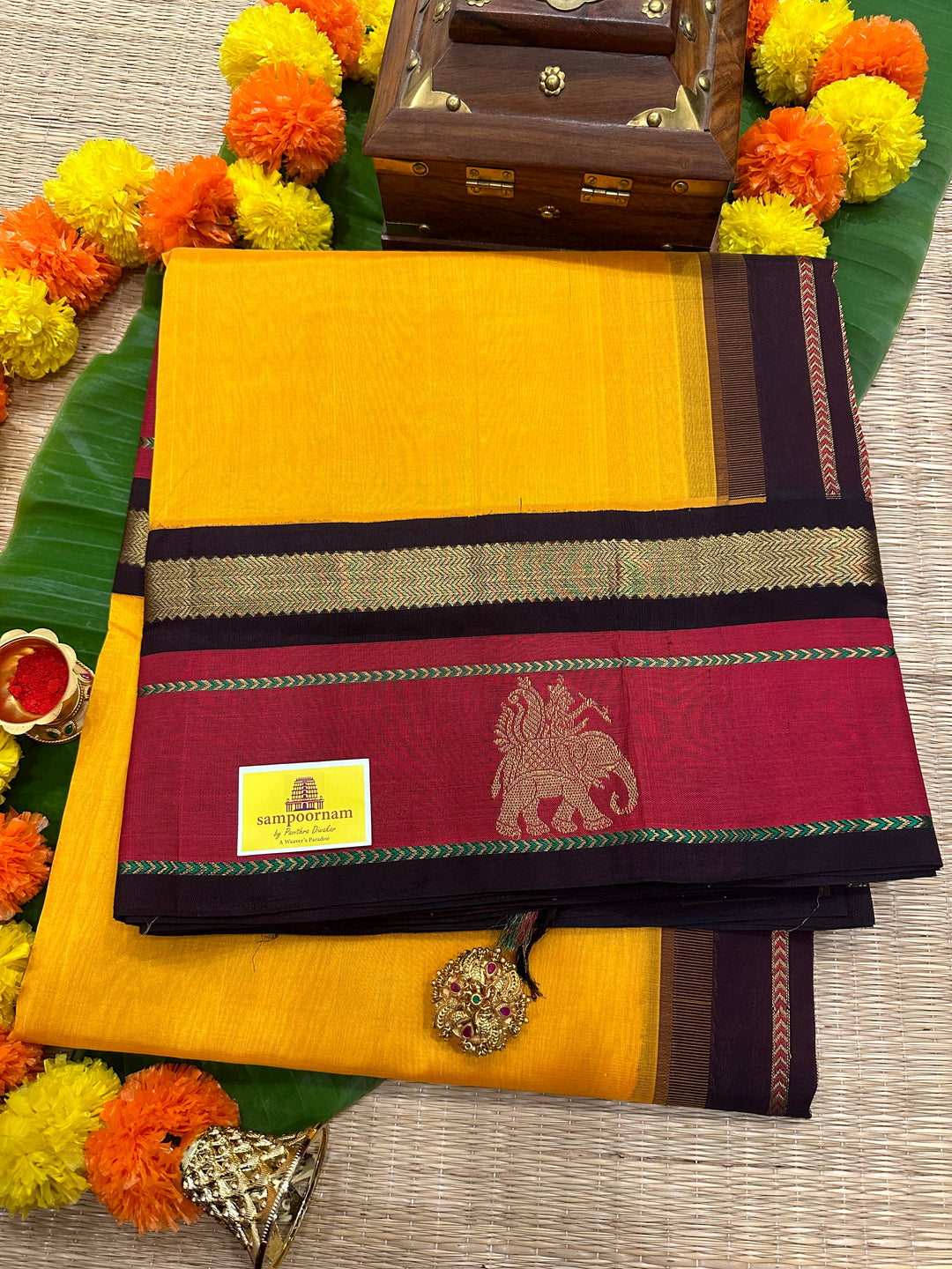 Mambazha Manjal with Brown with Elephant Motif in The Border and Rich Pallu Korvai Silk Cotton Saree