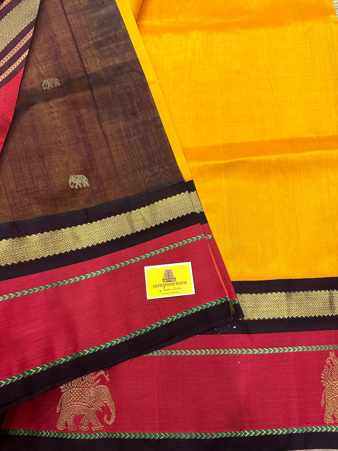 Mambazha Manjal with Brown with Elephant Motif in The Border and Rich Pallu Korvai Silk Cotton Saree