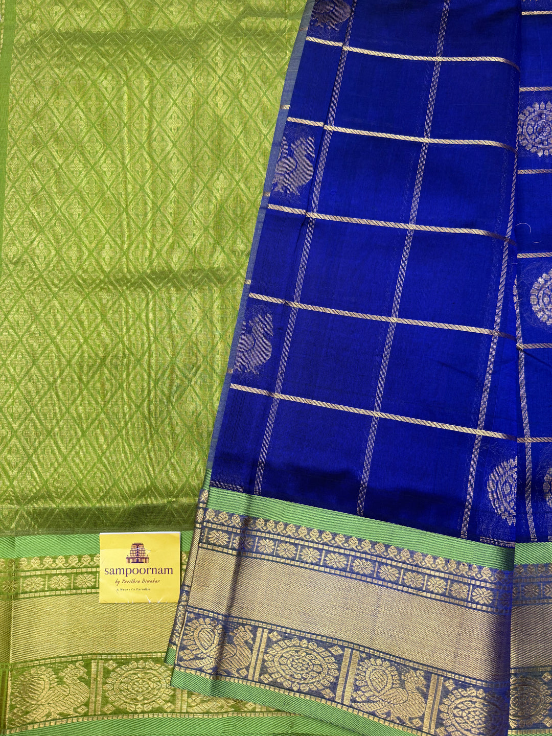 Indigo Blue with Lemon Green , Mayil and Chakram Butta in the Body, Traditional Borders and Rich Pallu Mayil Chakram Silk Cotton Saree