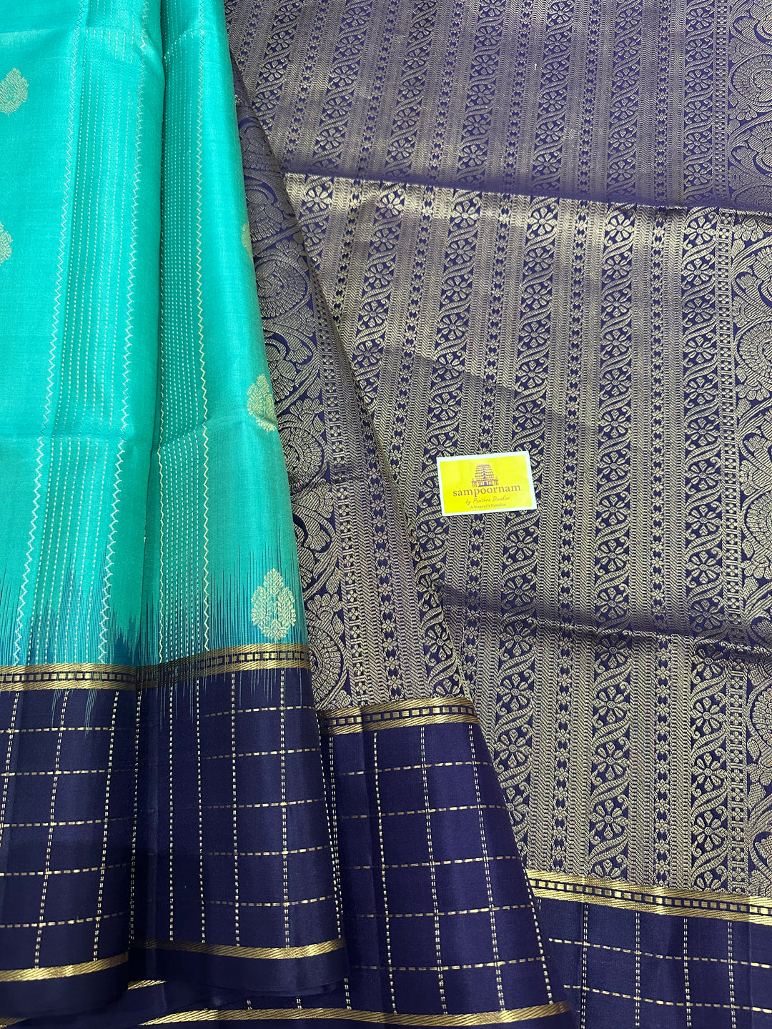 Light Greenish Blue with Dark Blue ,Zari Checks In the Border , Silver and Gold Zari Lines in the Body and Rich Pallu, Pure Soft Silk Saree