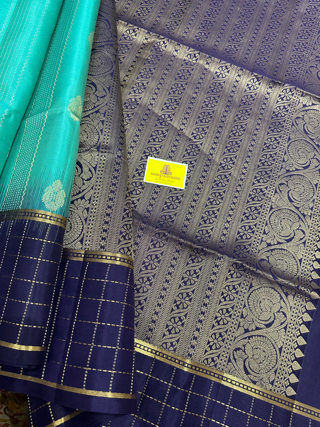 Light Greenish Blue with Dark Blue ,Zari Checks In the Border , Silver and Gold Zari Lines in the Body and Rich Pallu, Pure Soft Silk Saree