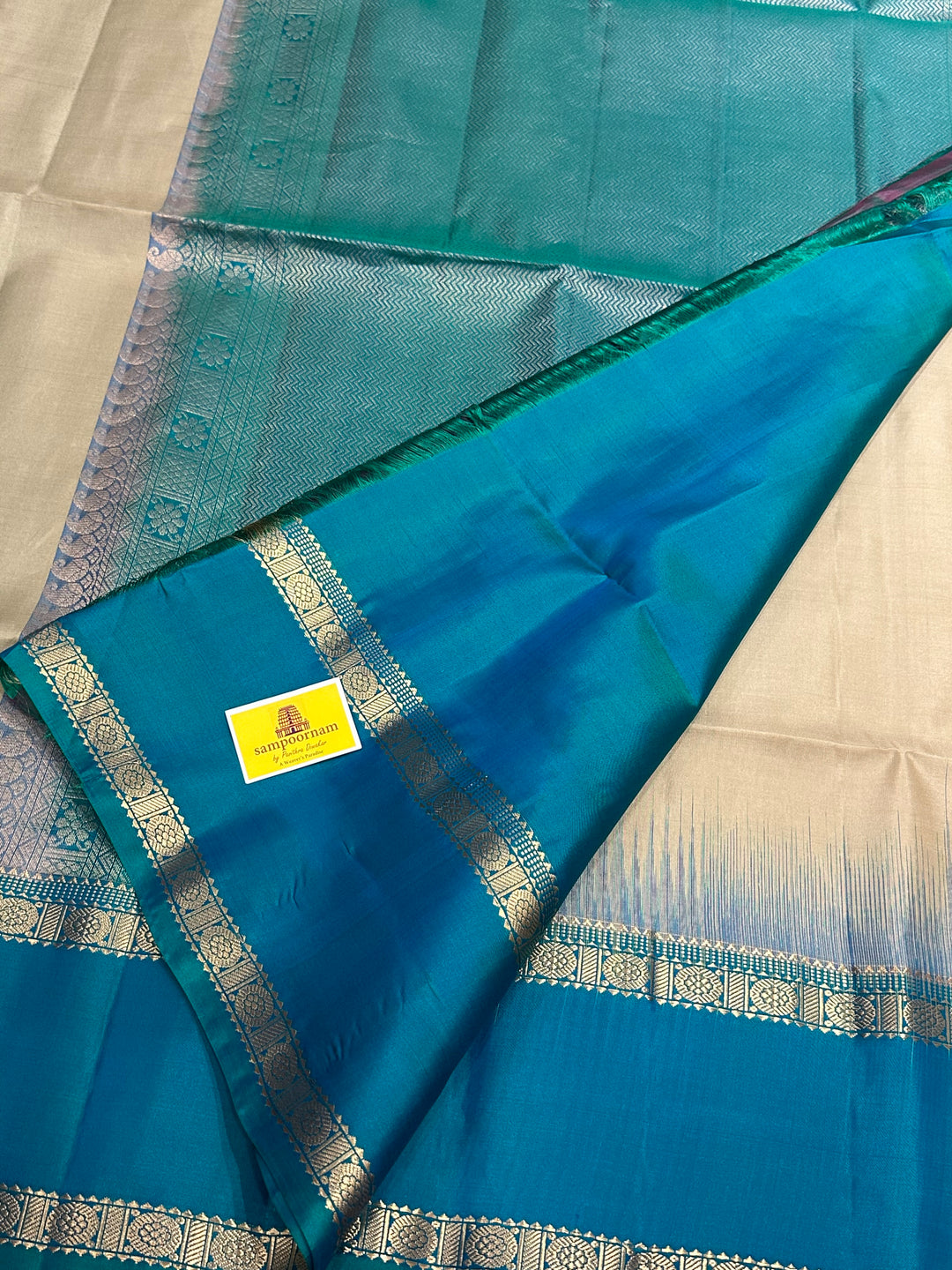 Ven Pattu with Blue Rettapet Border , Zari Motif in the Body and Rich Pallu Pure Soft Silk Saree