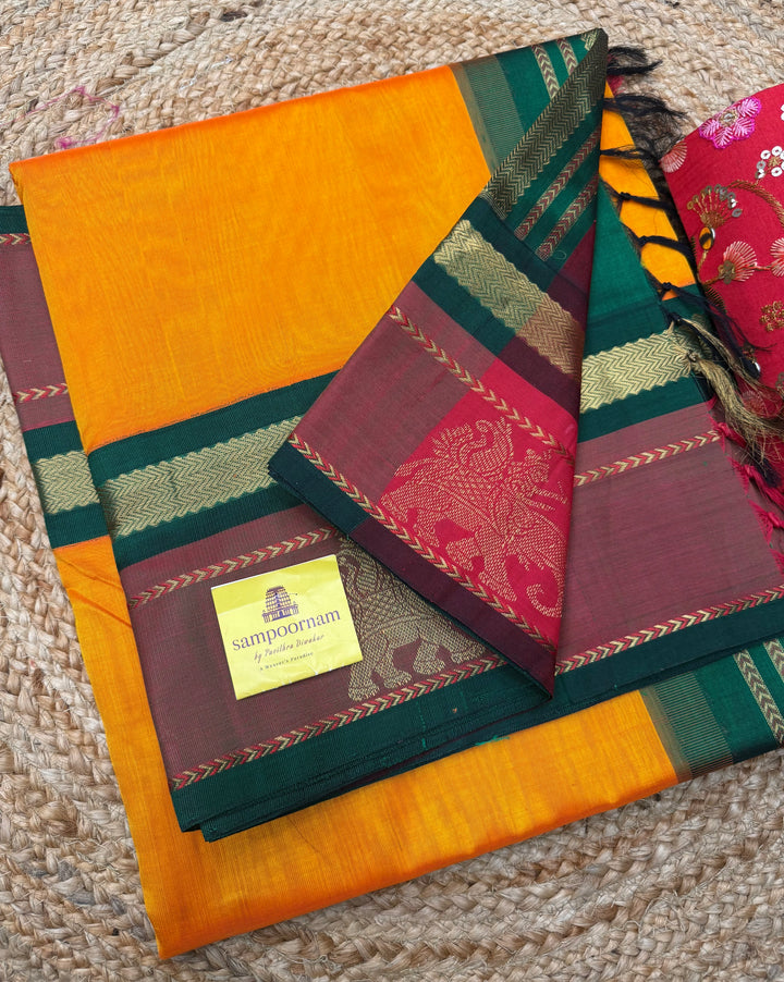 Mambazha Manjal with Green , Elephant motifs in the borders and Traditional Pallu Korvai Silk Cotton Saree