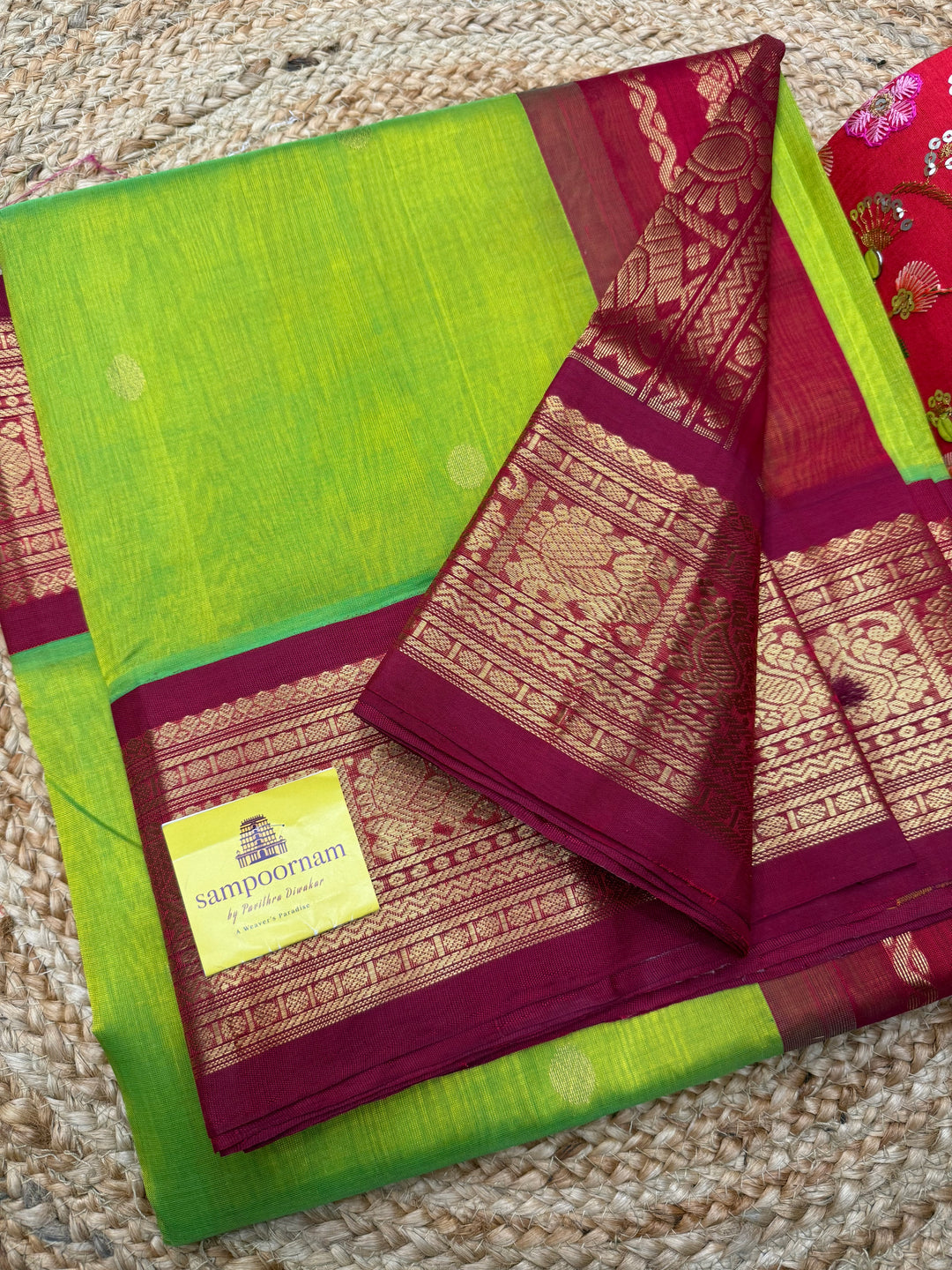Parrot Green with Red , rich  Zari butta in the body and Traditional Borders , rich Pallu Korvai Silk Cotton Saree