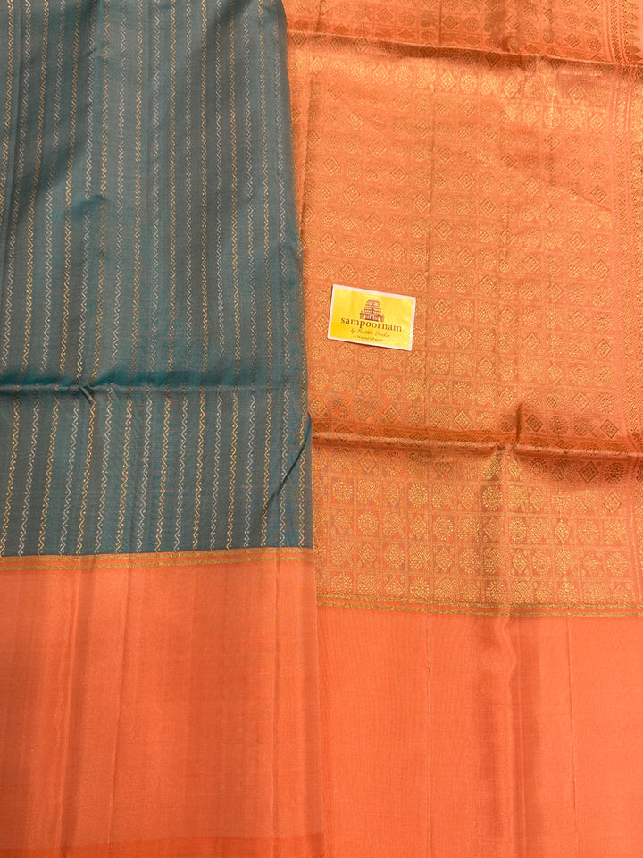 Light Blue with Pastel Orangish Pink Silver and Gold Zari Lines in the Body and Rich Zari Pallu Pure Soft Silk Saree