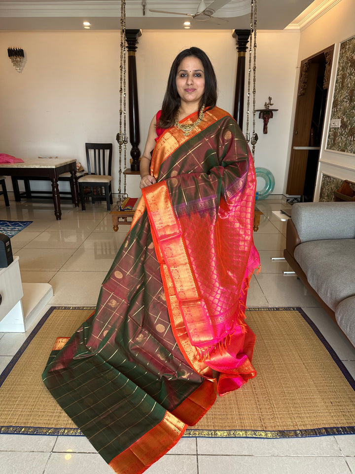 Manthulir, Greenish Brown with Orangish Pink Mayil Chakram Silk Cotton Saree