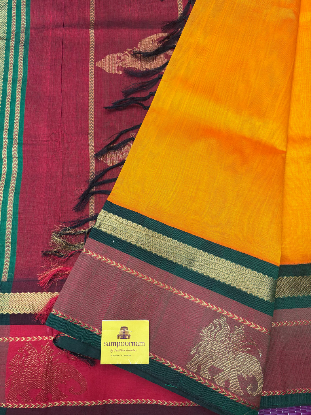 Mambazha Manjal with Green , Elephant motifs in the borders and Traditional Pallu Korvai Silk Cotton Saree