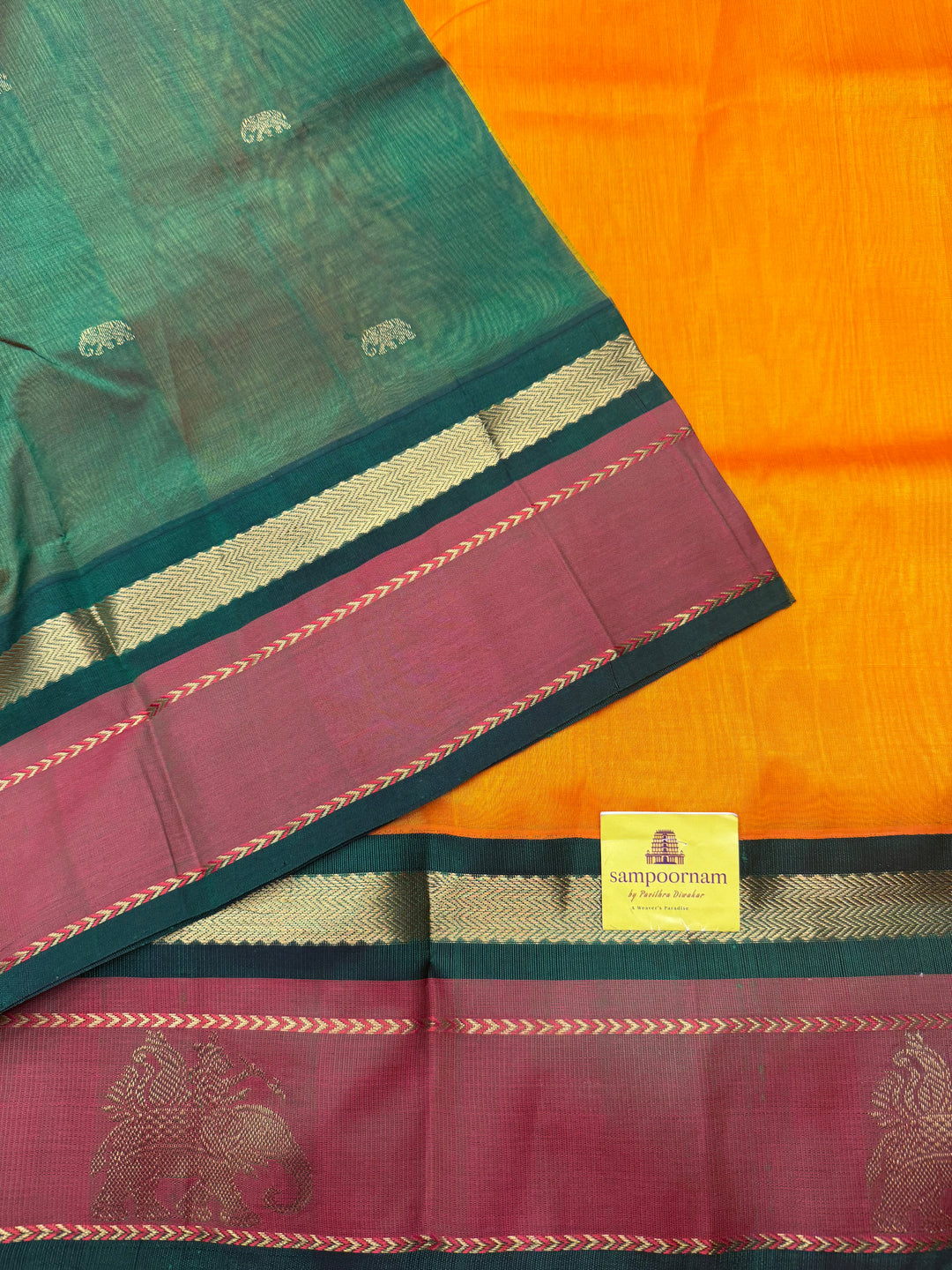 Mambazha Manjal with Green , Elephant motifs in the borders and Traditional Pallu Korvai Silk Cotton Saree