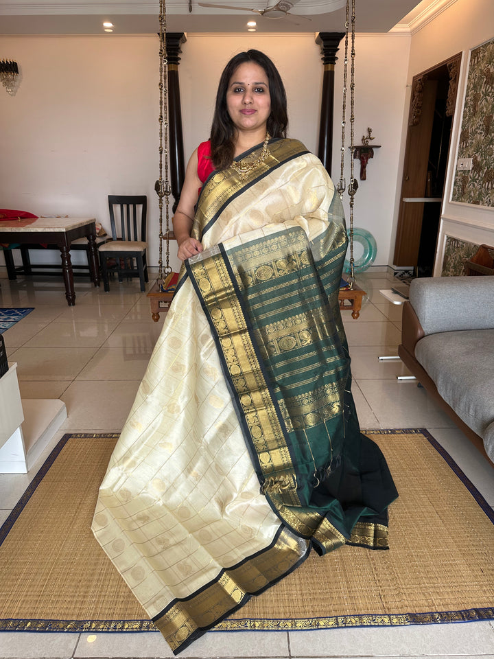 Offwhite with Green Mayil Chakram Silk Cotton Saree