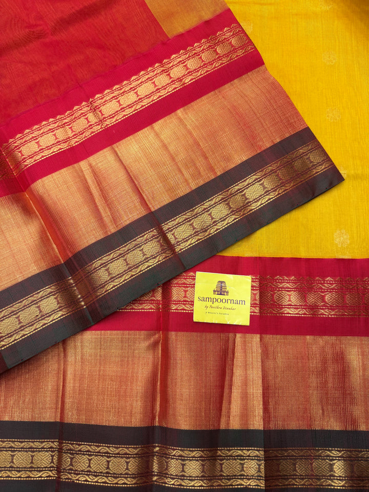 Manjal with Red , rich Floral Zari butta in the body  and One side Triple  Borders , rich Pallu Korvai Silk Cotton Saree