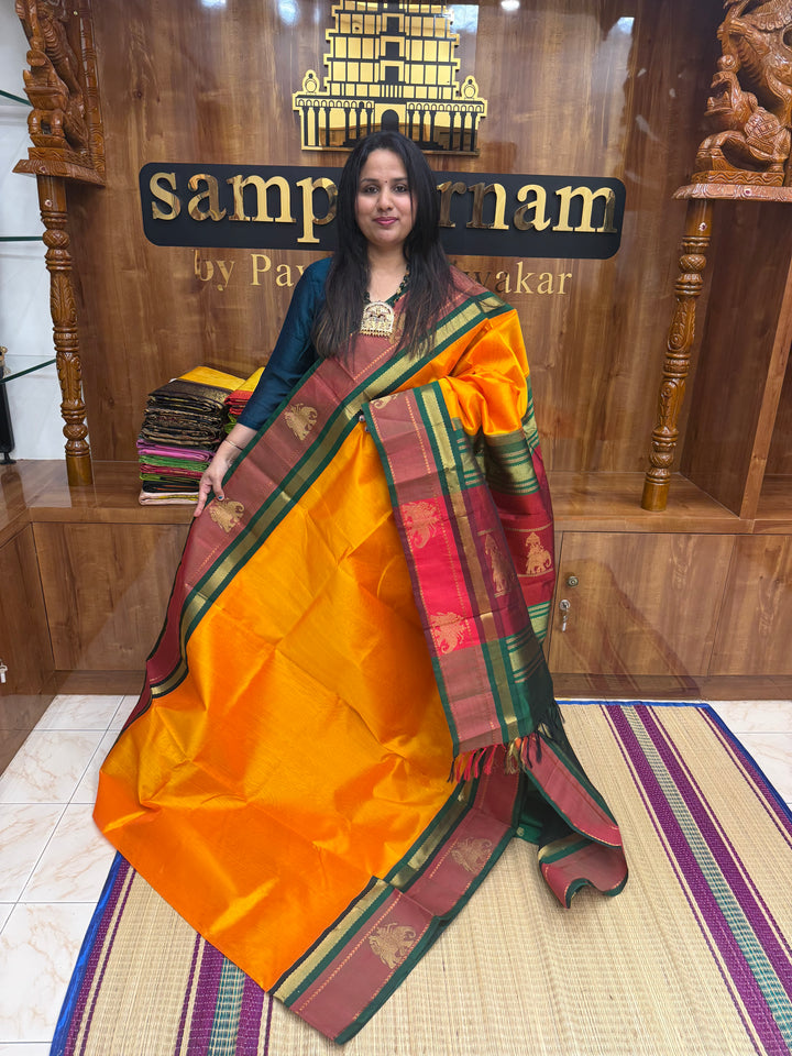 Mambazha Manjal with Green , Elephant motifs in the borders and Traditional Pallu Korvai Silk Cotton Saree