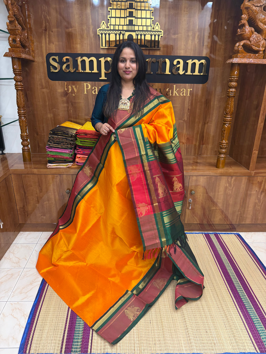 Mambazha Manjal with Green , Elephant motifs in the borders and Traditional Pallu Korvai Silk Cotton Saree