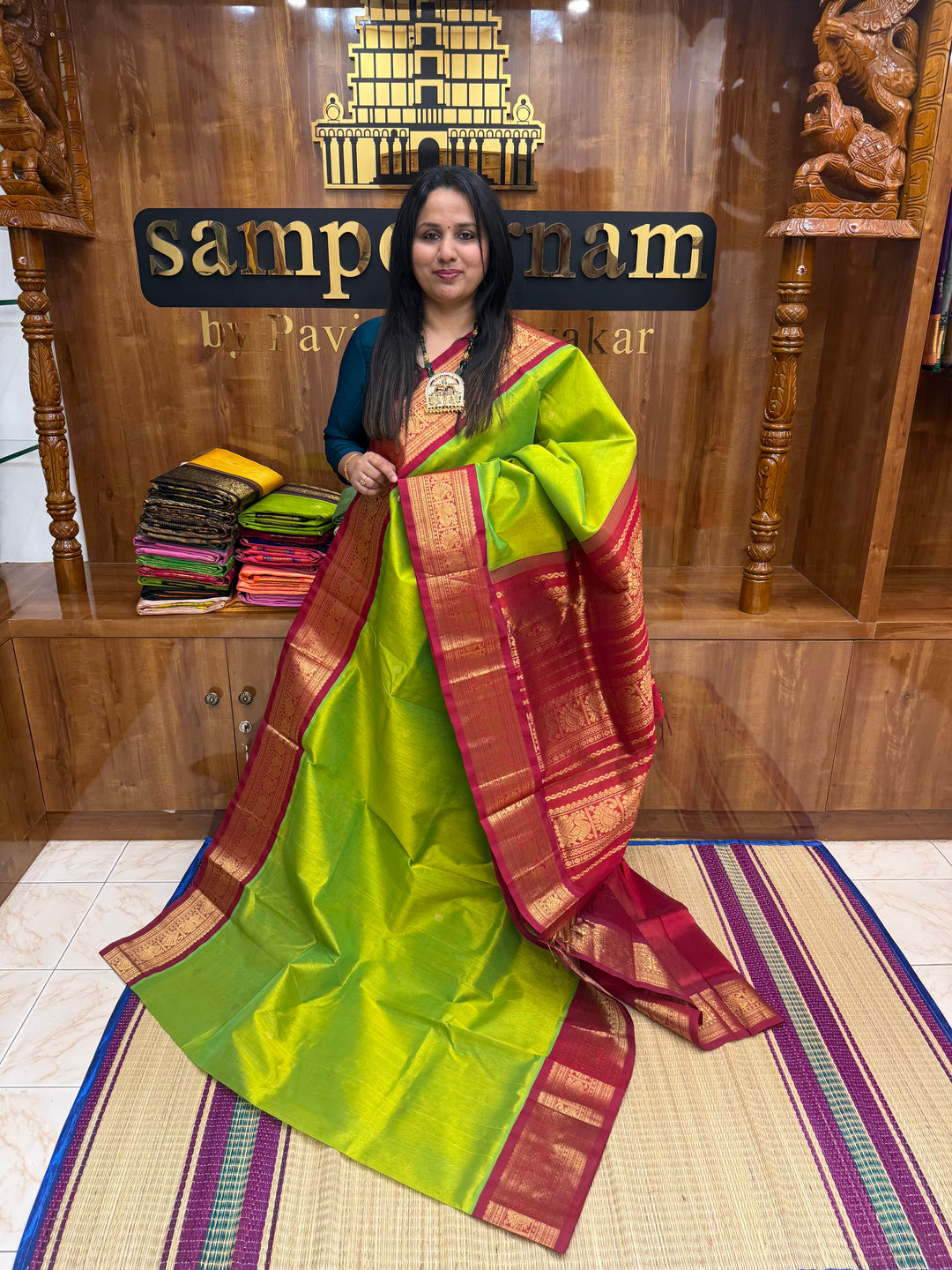 Parrot Green with Red , rich  Zari butta in the body and Traditional Borders , rich Pallu Korvai Silk Cotton Saree