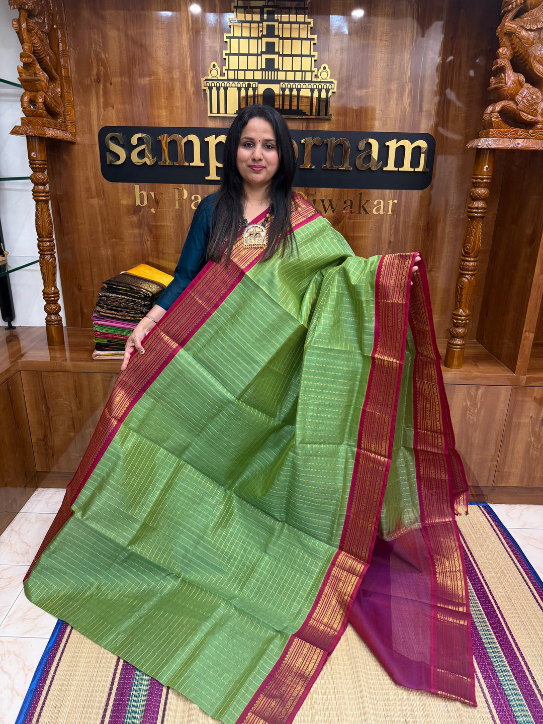Green with Magenta , Zari Checks in the body and Traditional  border , rich Pallu Korvai Silk Cotton Saree