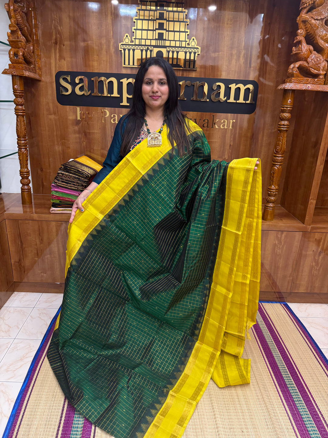 Dark Green with Lemon Yellow , Zari Checks with rich Butta in the body and rettapet  border , rich Pallu Korvai Silk Cotton Saree