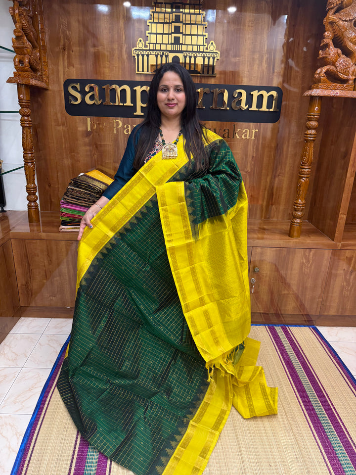 Dark Green with Lemon Yellow , Zari Checks with rich Butta in the body and rettapet  border , rich Pallu Korvai Silk Cotton Saree